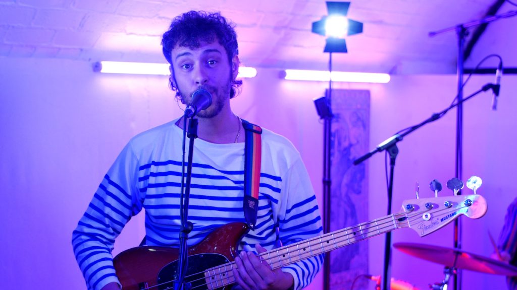 Alex from the Parrots sings and plays bass guitar