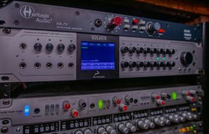 A rack of pro audio interfaces and preamps or pre's